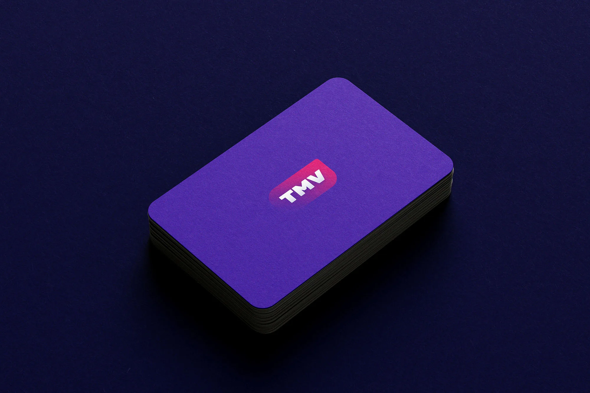 The Muslim Vibe — a stack of purple business cards carrying the TMV mark
